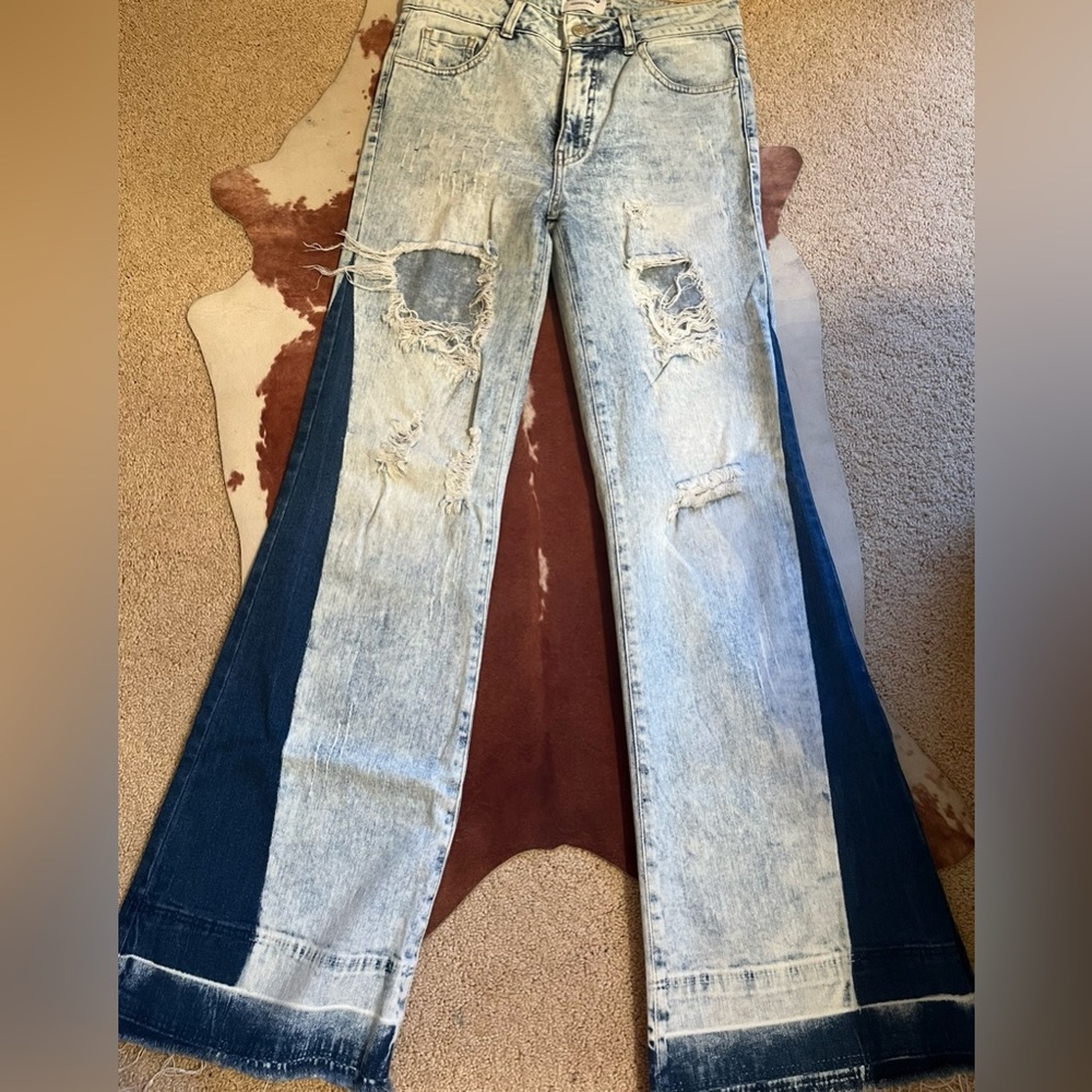 Distressed flare jeans 
size: 3